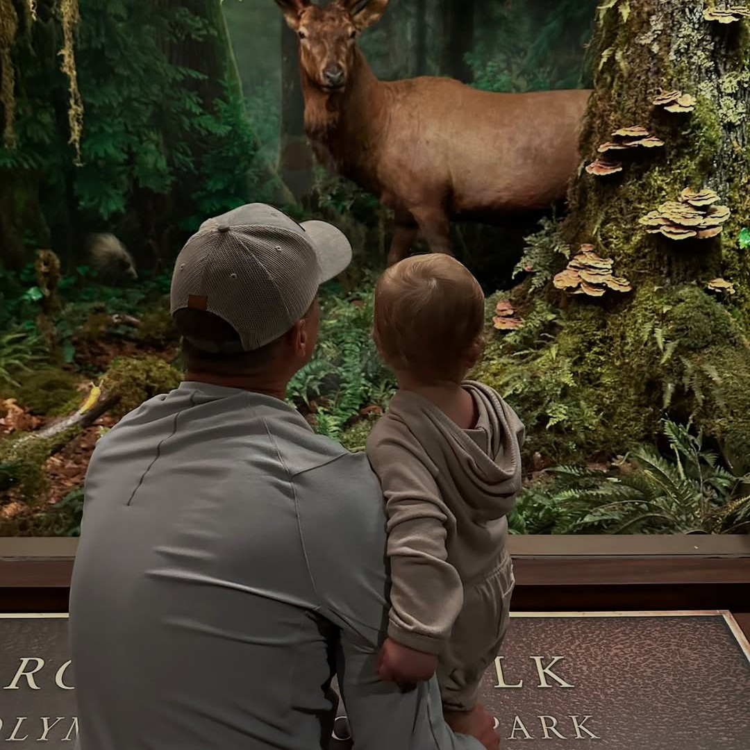 POV TN Bass Pro Shops Bass Pro Shops father and sun looking at diorama with deer
