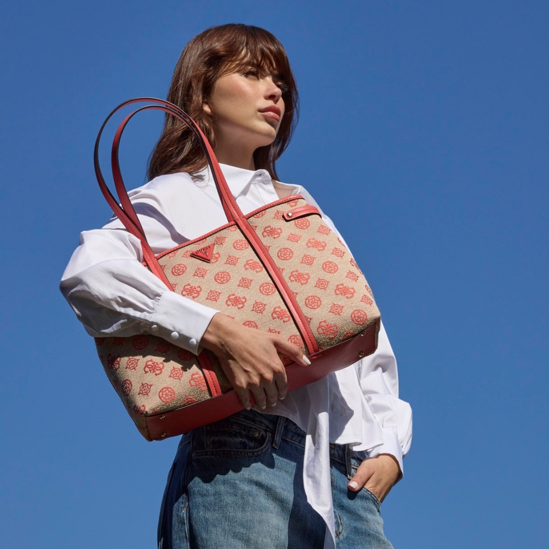 POV TN GUESS Guess Factory woman holding handbag